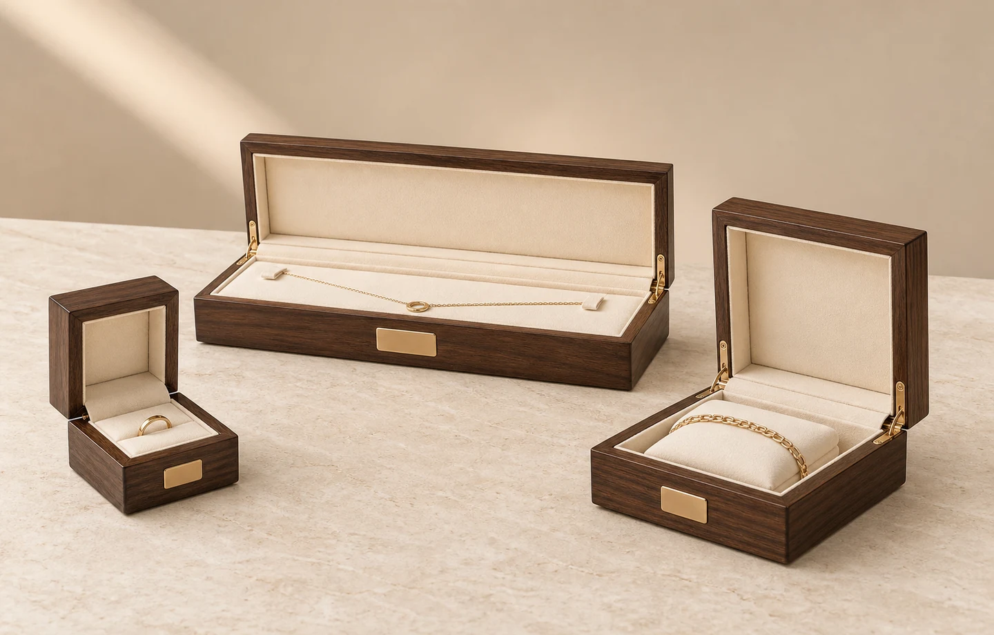 Custom wooden jewelry boxes with velvet lining -- ring box, necklace box, and bracelet box displayed together