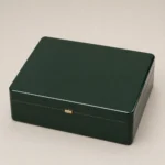 wellness collection wood case in emerald lacquer closed front view