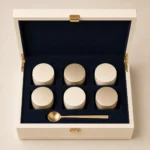 curated tea collection wood case in ivory lacquer top down interior view