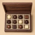 artisan chocolate assortment wooden box with walnut finish top down interior view