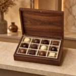 artisan chocolate assortment wooden box with walnut finish showroom application scene