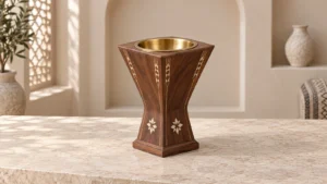 Wood-grain pedestal incense burner with cream decorative details and an empty metal bowl