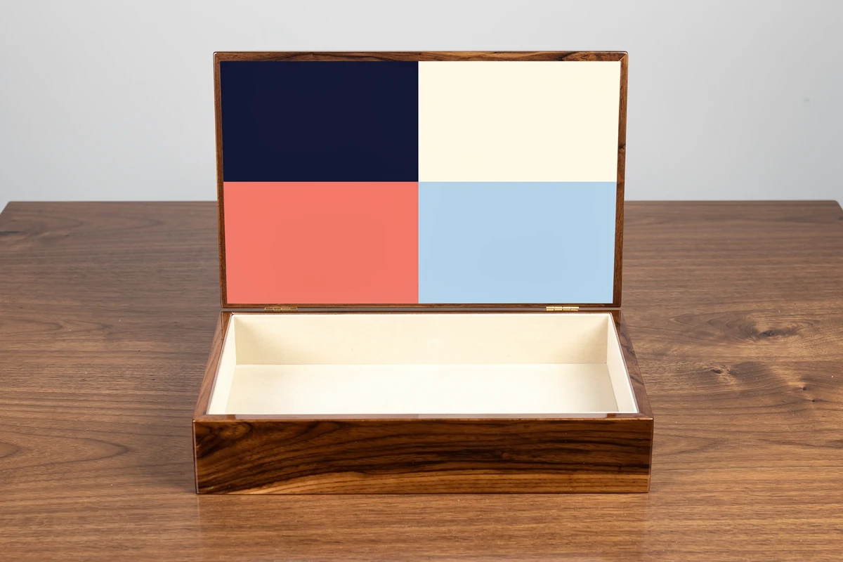 Artwork for custom wooden boxes shown as geometric decoration inside an open wood-grain lid